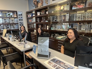 Photo of staff at front desk