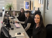 Photo of staff at front desk