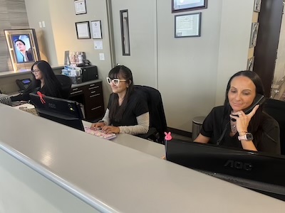 Photo of front desk staff